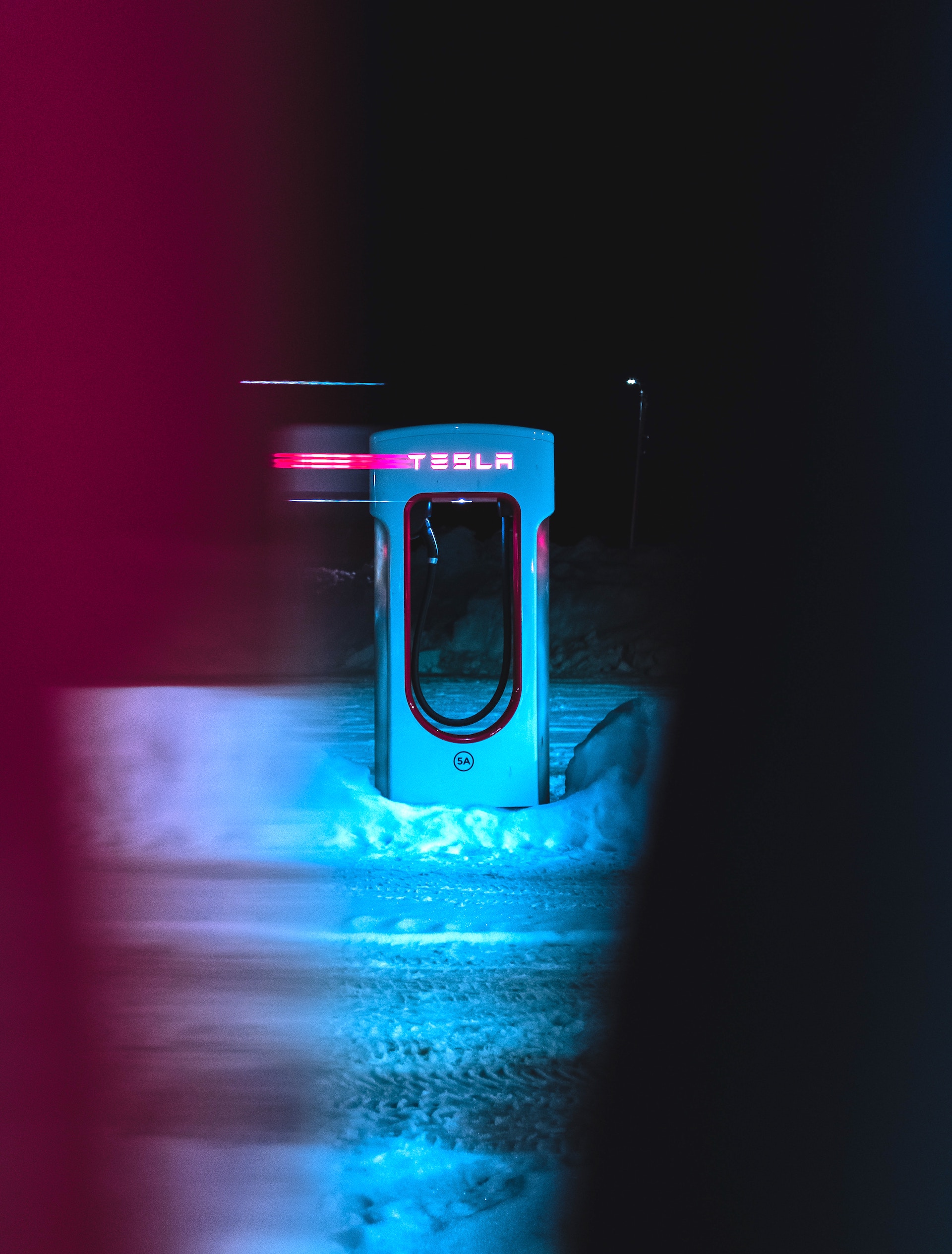 Photograph of a Tesla EV charging station